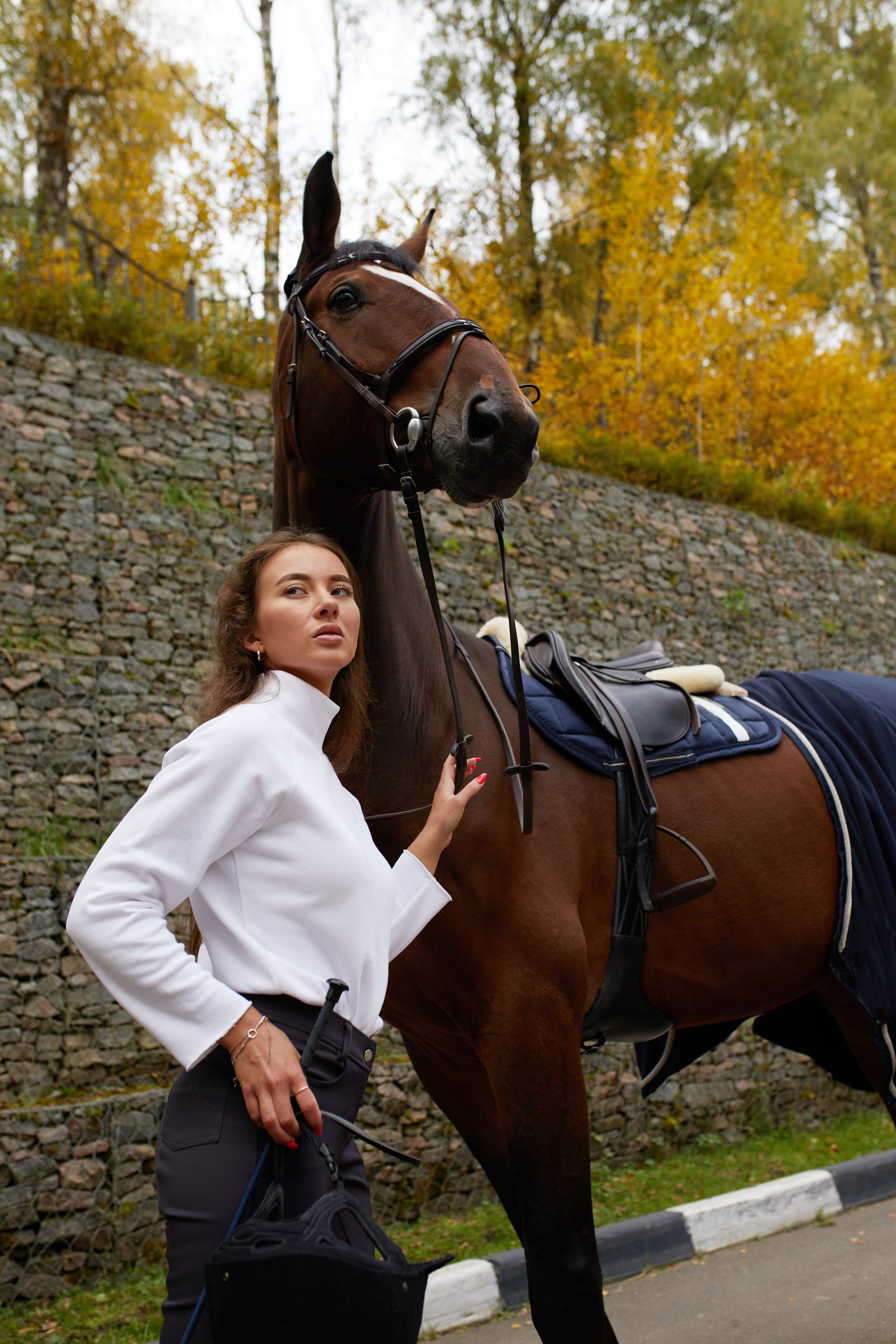 Rider with horse outdoors Australia — sustainable equestrian lifestyle and horse ownership