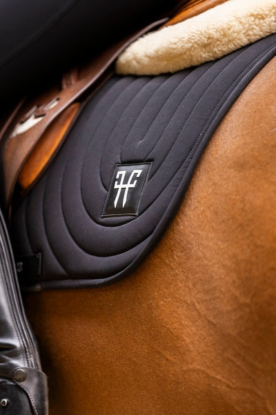 Ergonomic mixed saddle pad