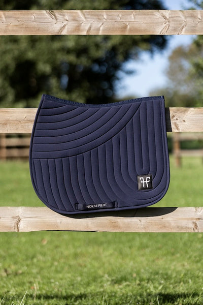 Ergonomic mixed saddle pad