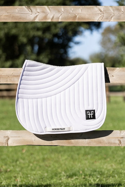 Ergonomic mixed saddle pad