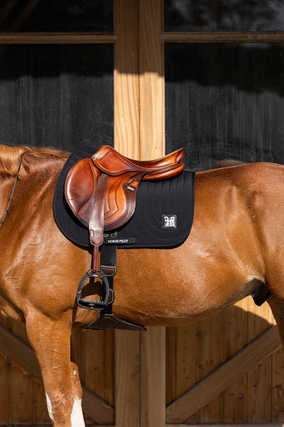 Ergonomic mixed saddle pad