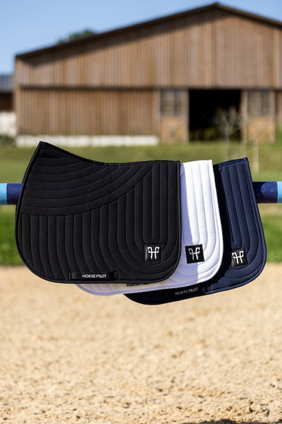 Ergonomic mixed saddle pad