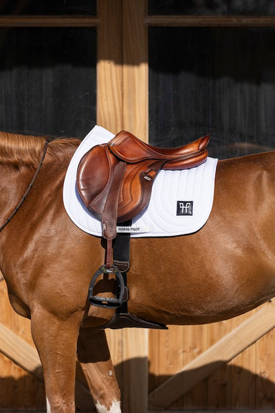 Ergonomic mixed saddle pad