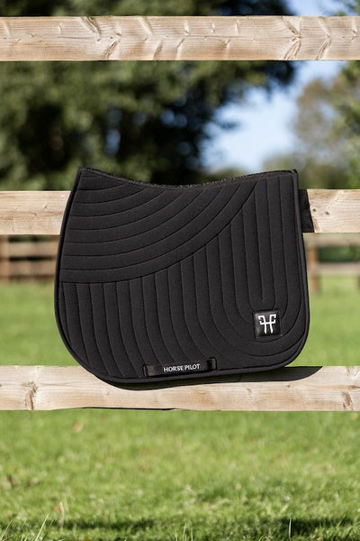 Ergonomic mixed saddle pad