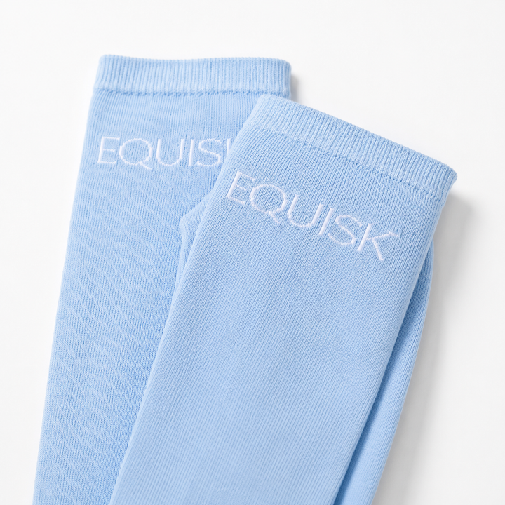 Light blue socks with 'EQUISK' branding on a white background