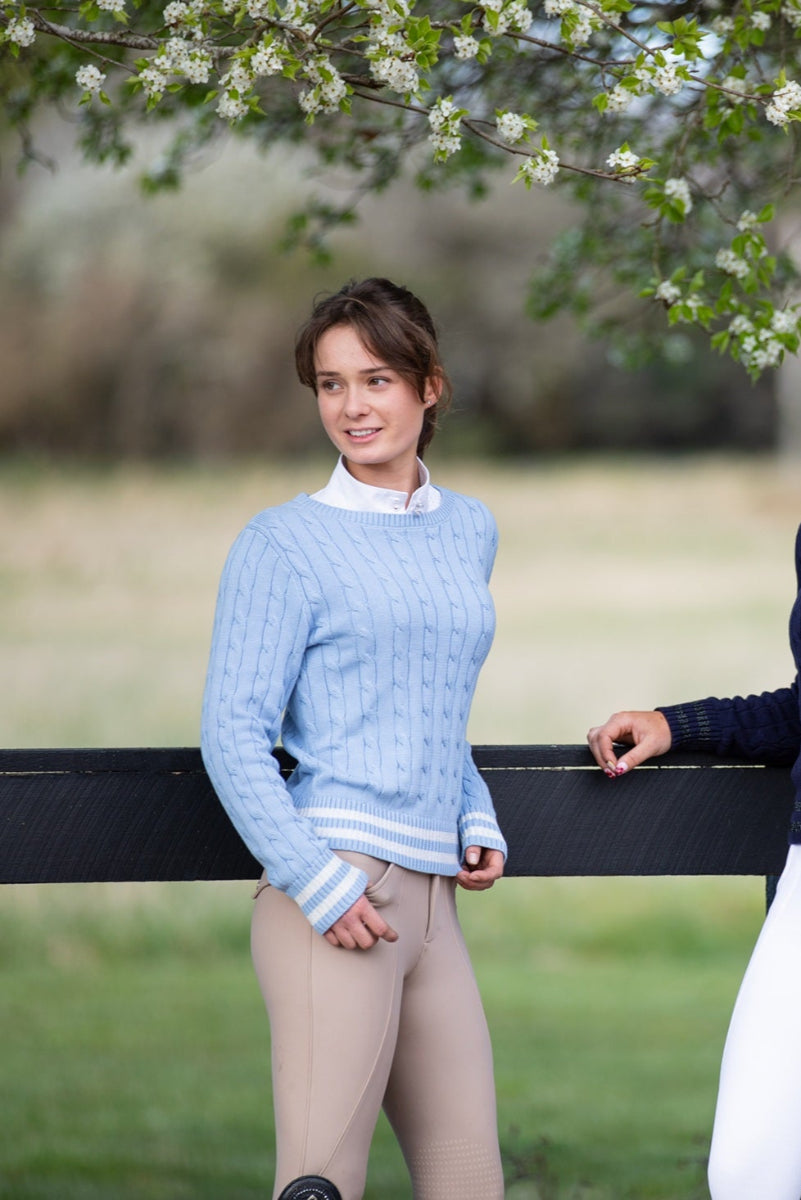 Model wearing Wilma Sport Signature Sweater in Silver Blue — breathable cotton sweater with soft shimmer trim.